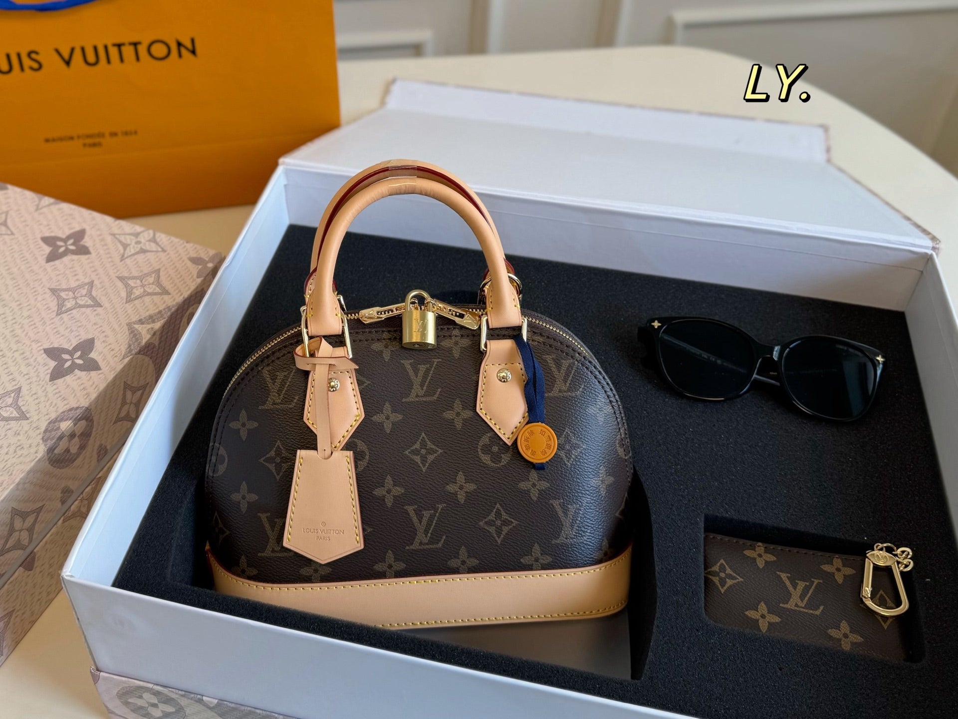 LV nano Alma Shell Bag