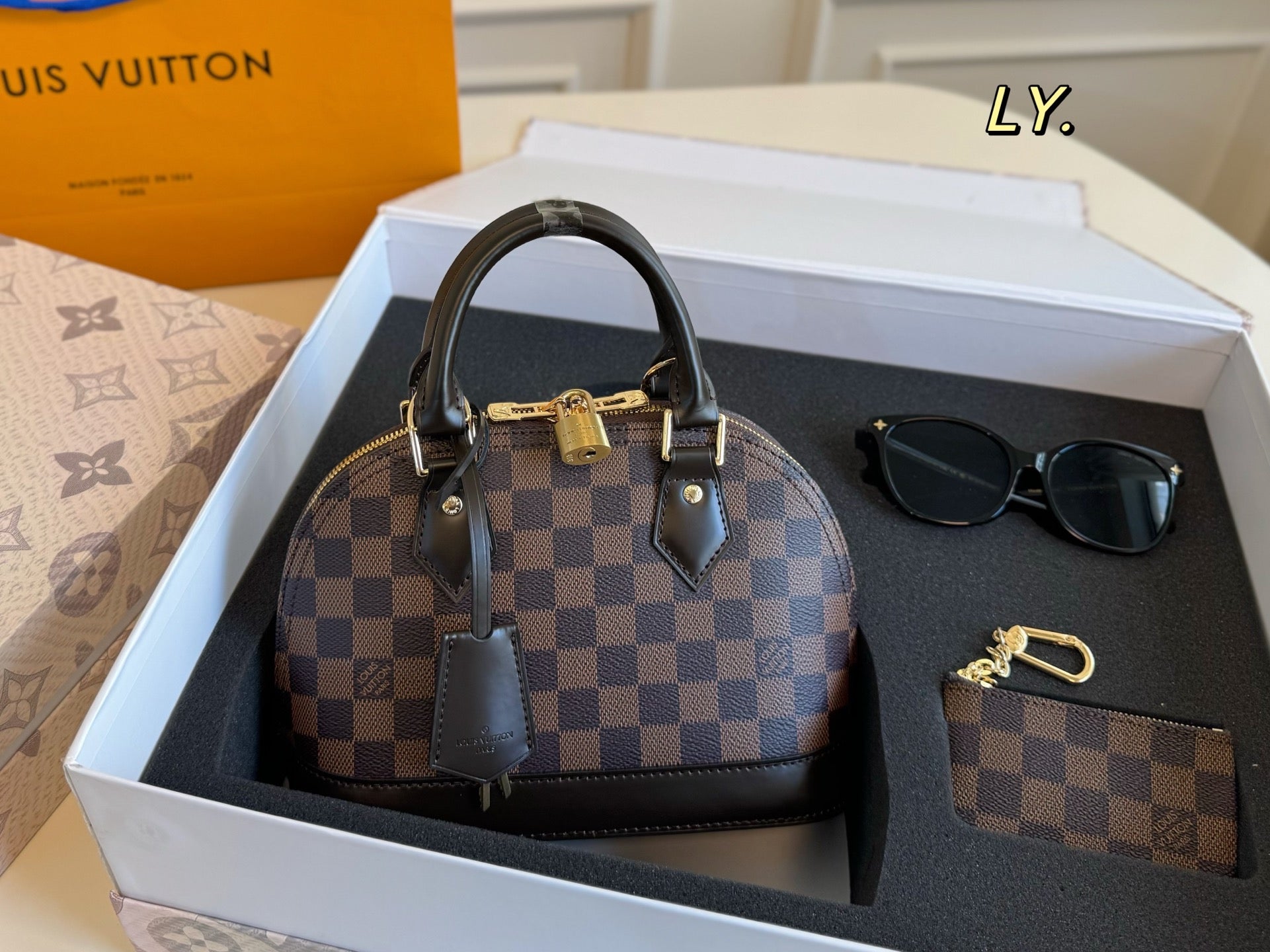 LV nano Alma Shell Bag