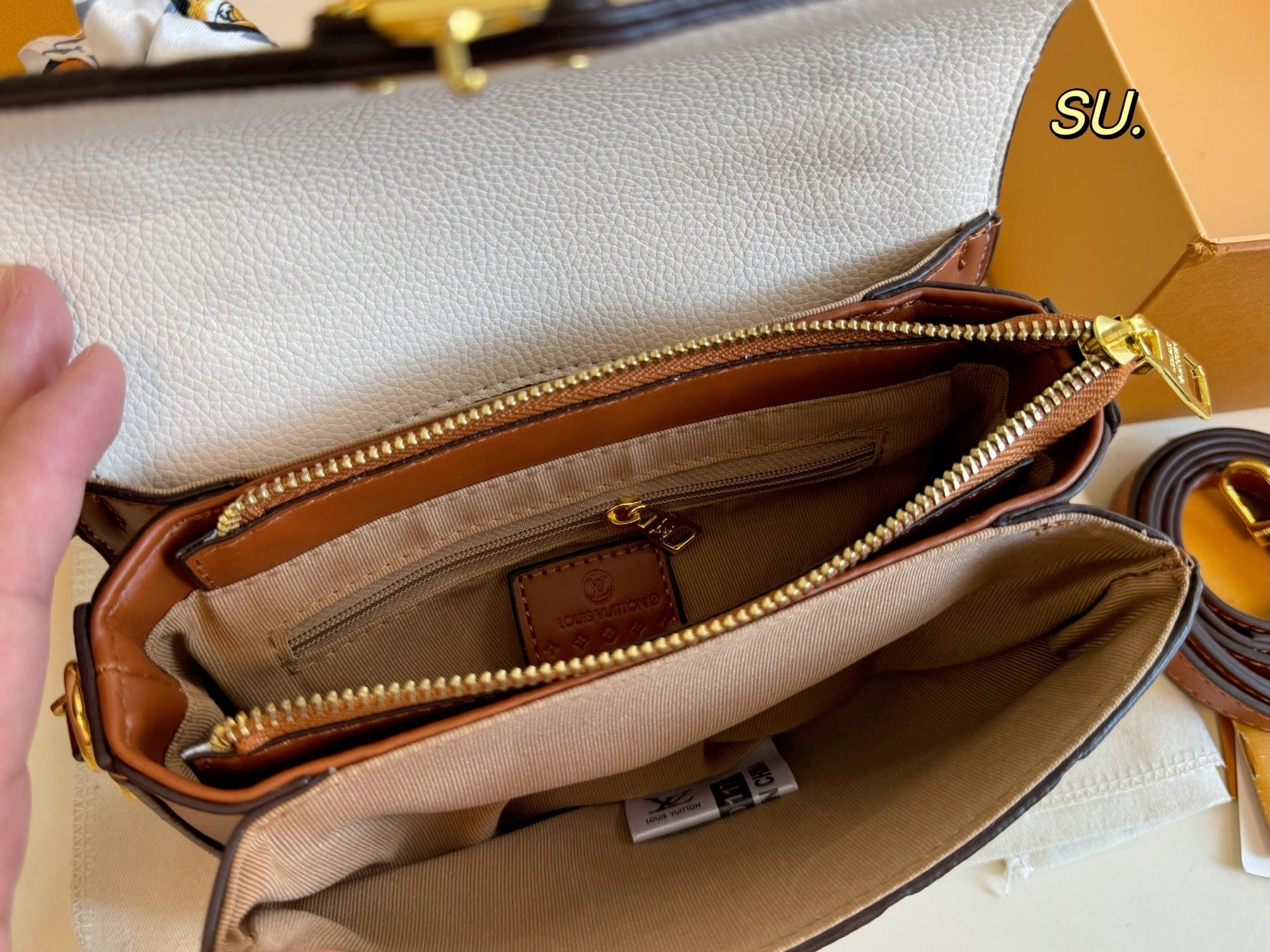 LV Embossed Messenger Bag