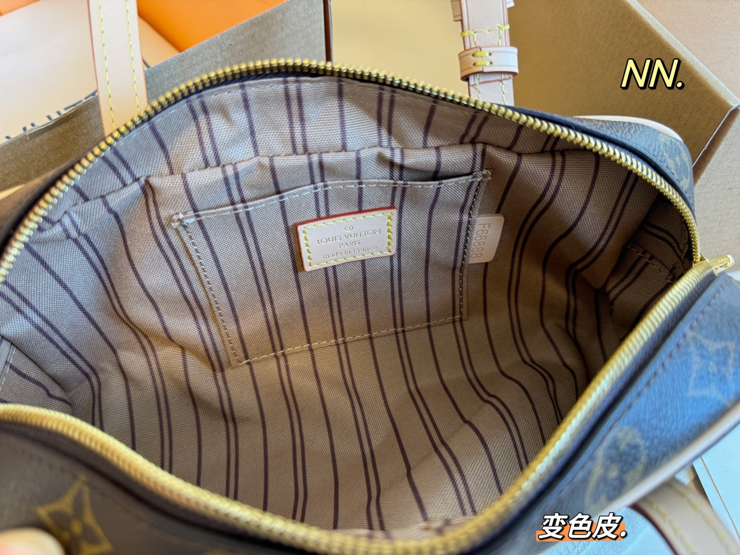 LV hang on bowler's bag