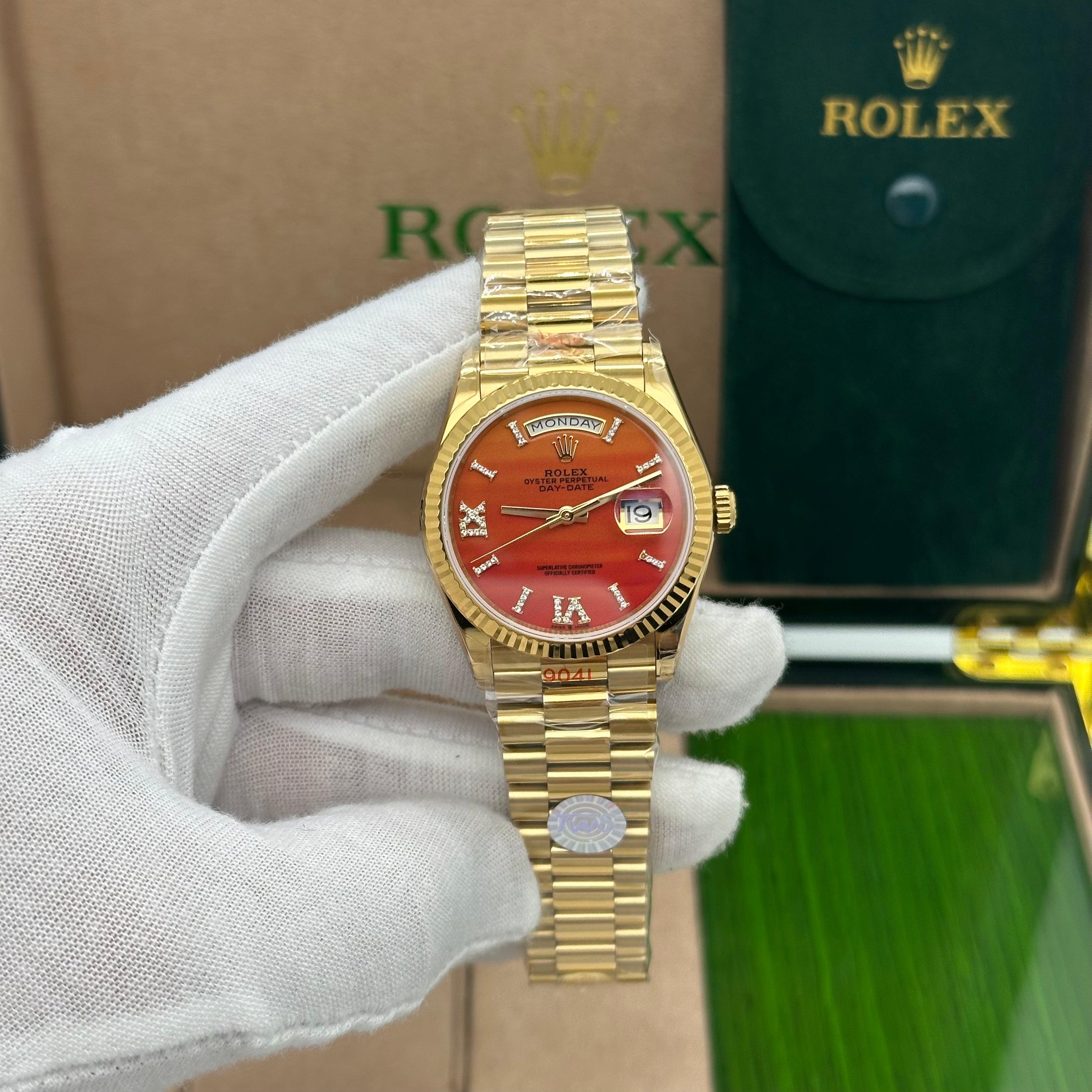 Rolex Oyster Perpetual Day-Date 36MM – Yellow Gold with Carnelian Dial