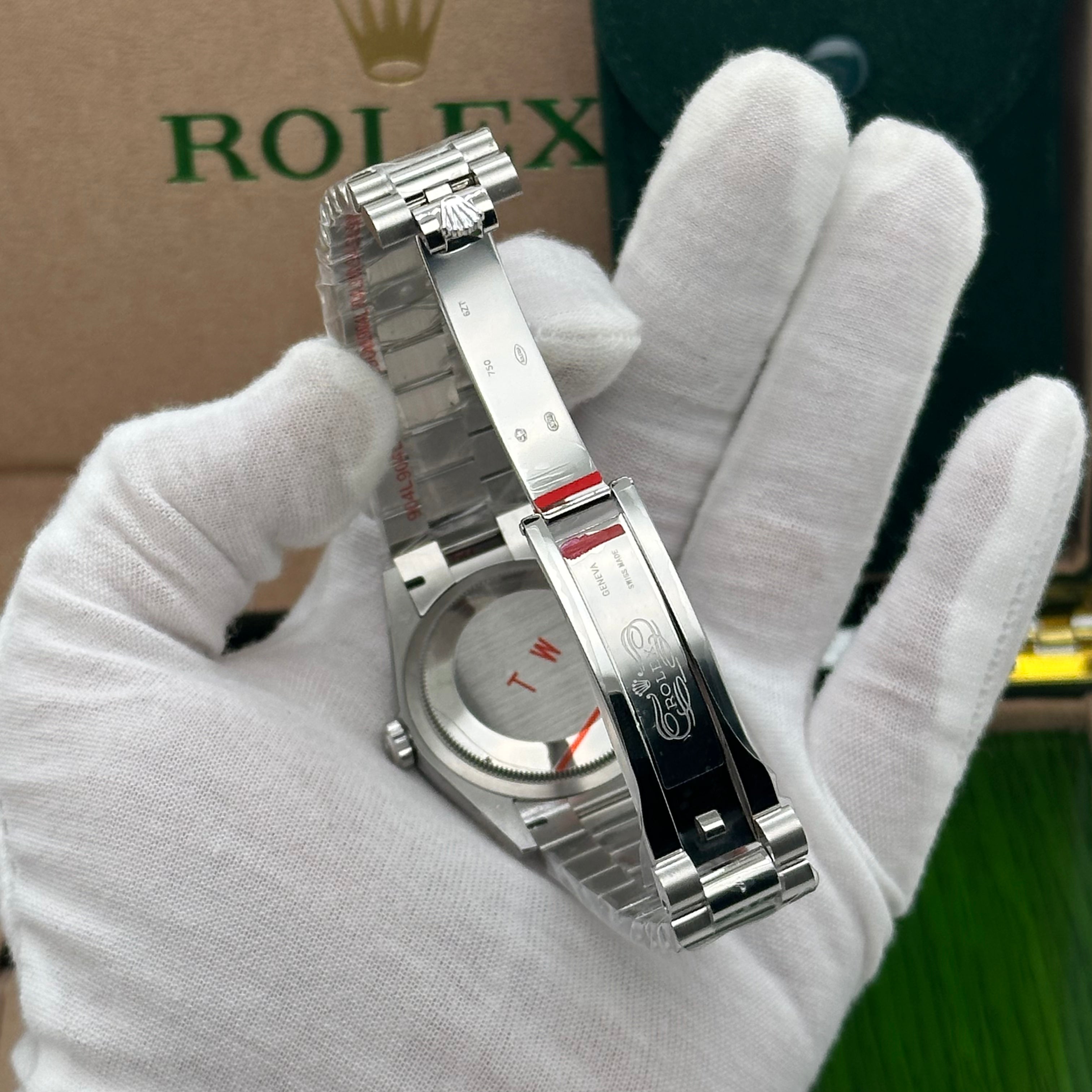 Rolex Day-Date 36mm White Gold Turquoise Dial with Diamond Bezel & Roman Diamond Markers