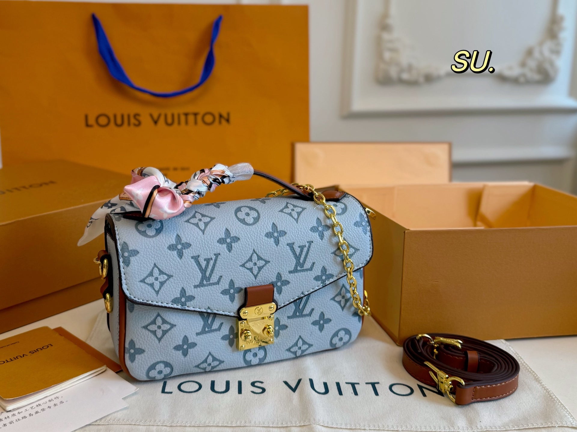 LV Embossed Messenger Bag