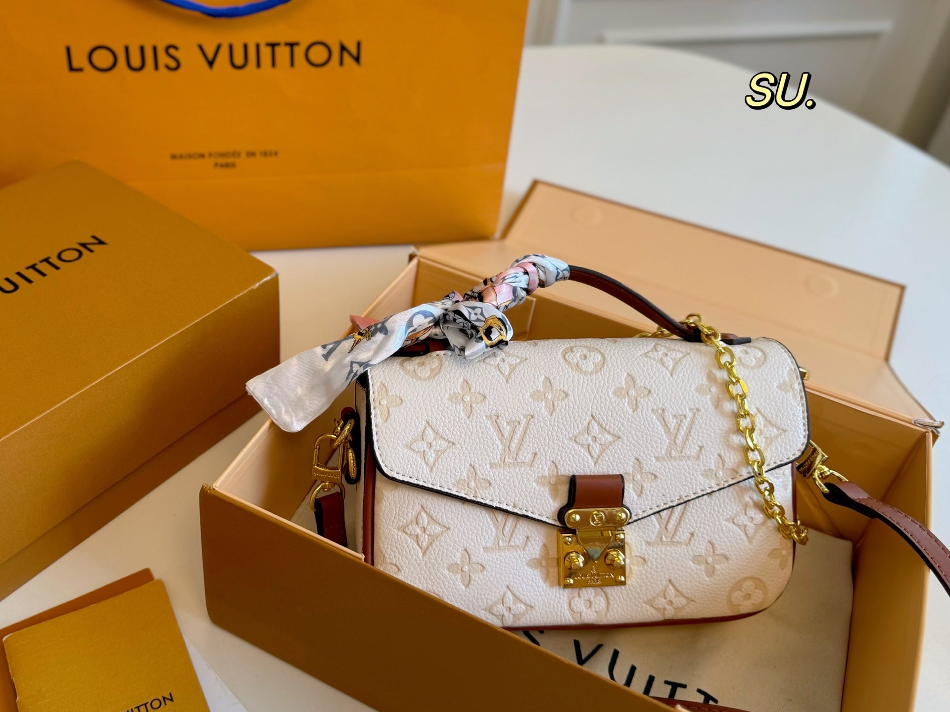 LV Embossed Messenger Bag