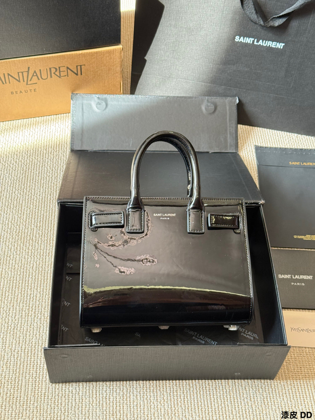 YSL Sac de Jour Patent leather accordion bag