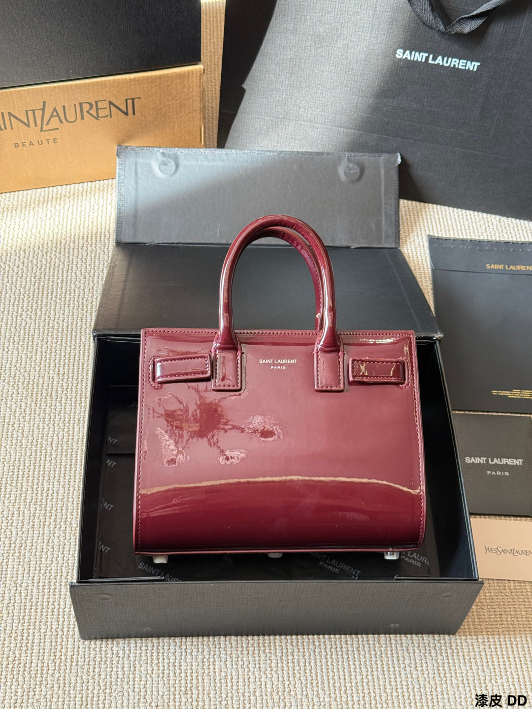 YSL Sac de Jour Patent leather accordion bag