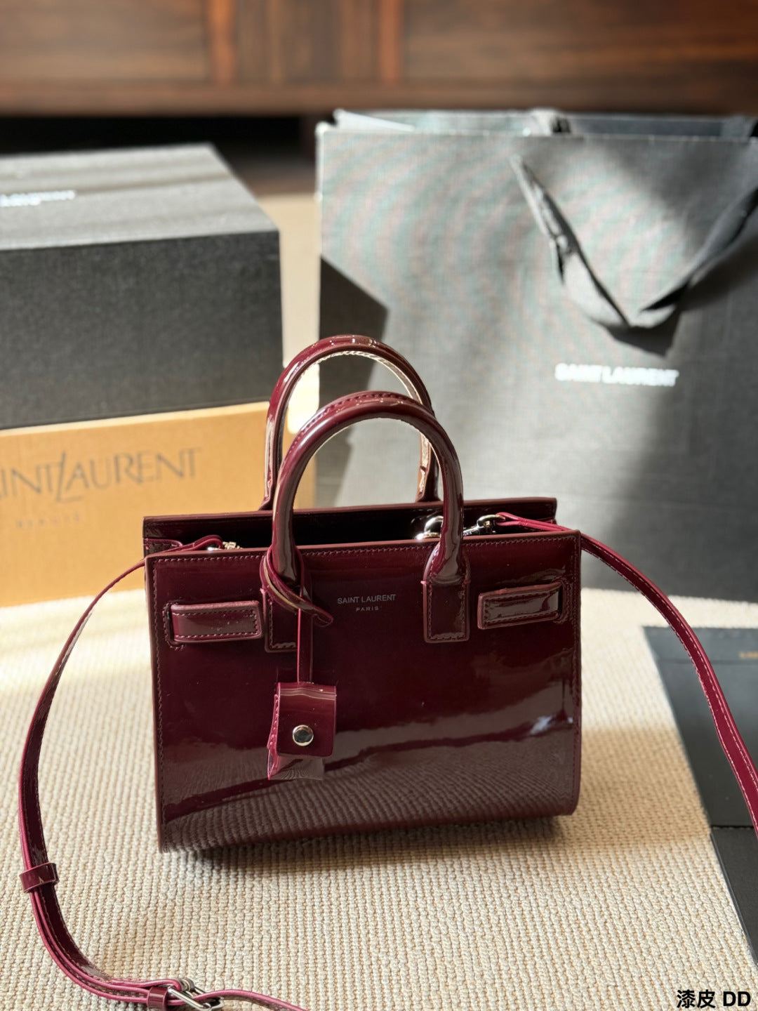 YSL Sac de Jour Patent leather accordion bag