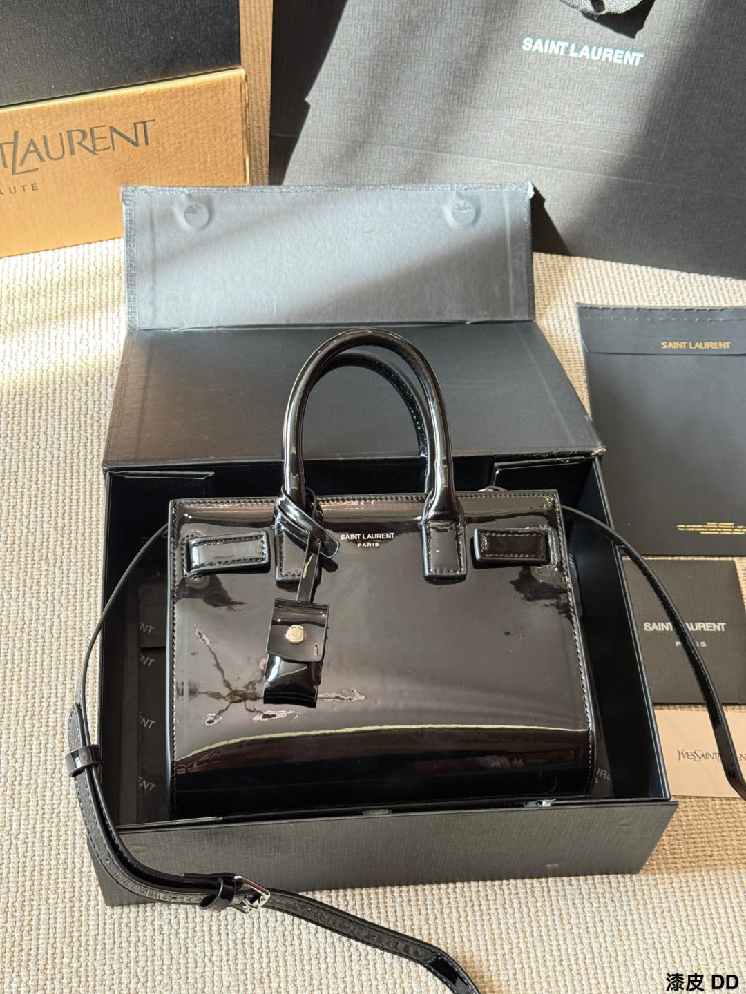 YSL Sac de Jour Patent leather accordion bag