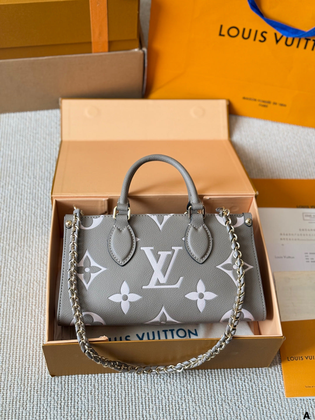 LV On The Go Horizontal Vintage-patterned Bag