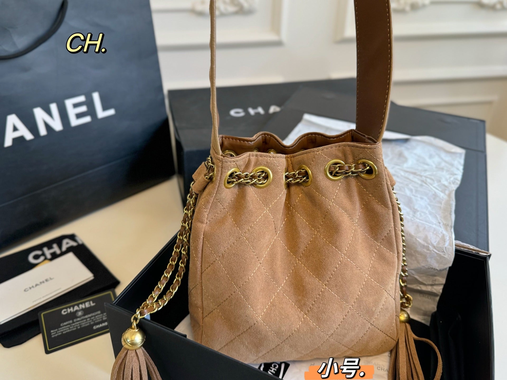Chanel 25a Tassel Chain Bucket Bag