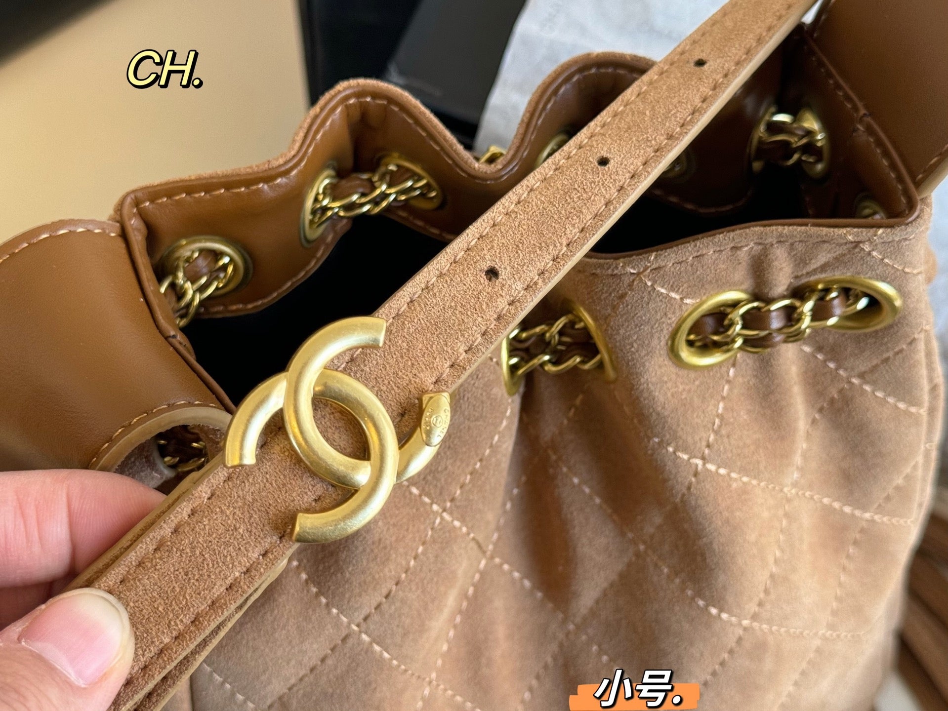 Chanel 25a Tassel Chain Bucket Bag