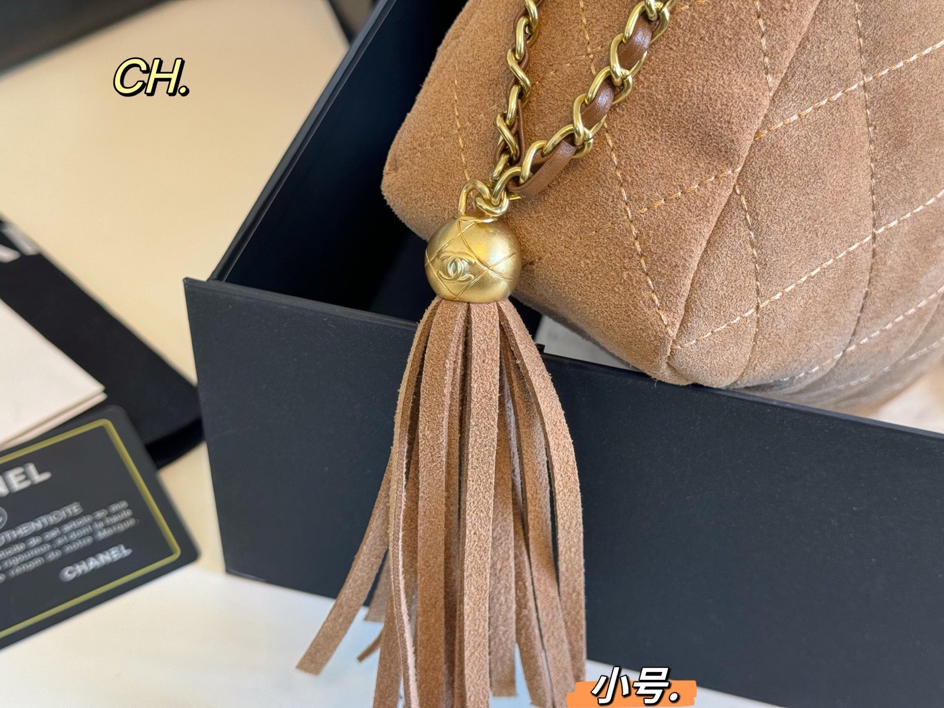 Chanel 25a Tassel Chain Bucket Bag