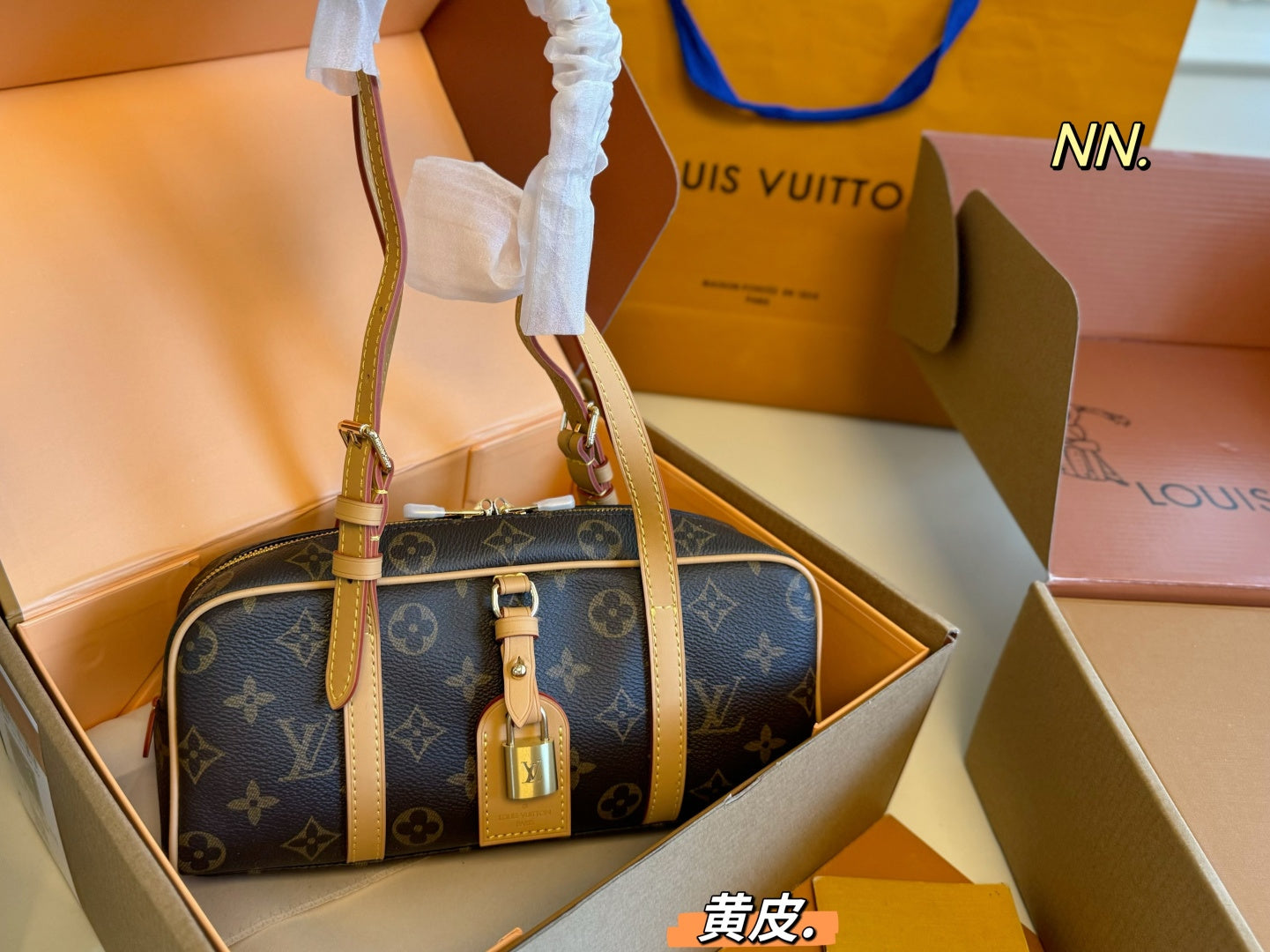 LV hang on bowler's bag