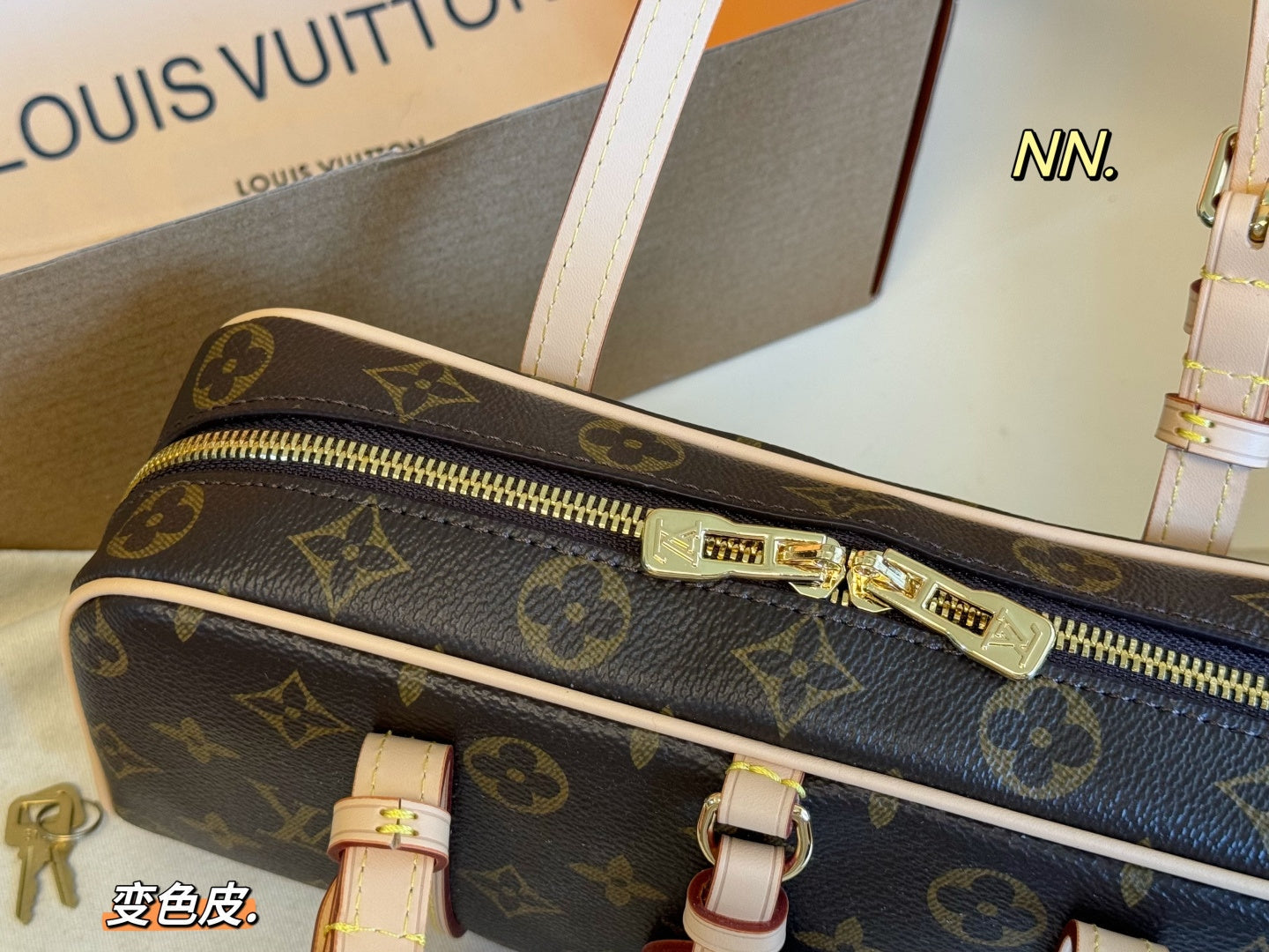 LV hang on bowler's bag