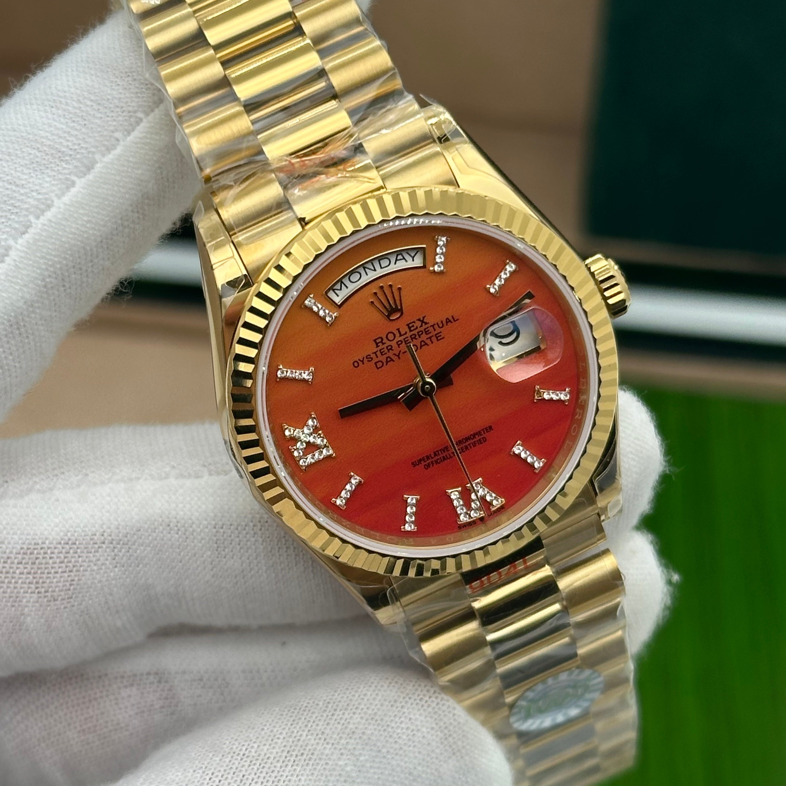 Rolex Oyster Perpetual Day-Date 36MM – Yellow Gold with Carnelian Dial
