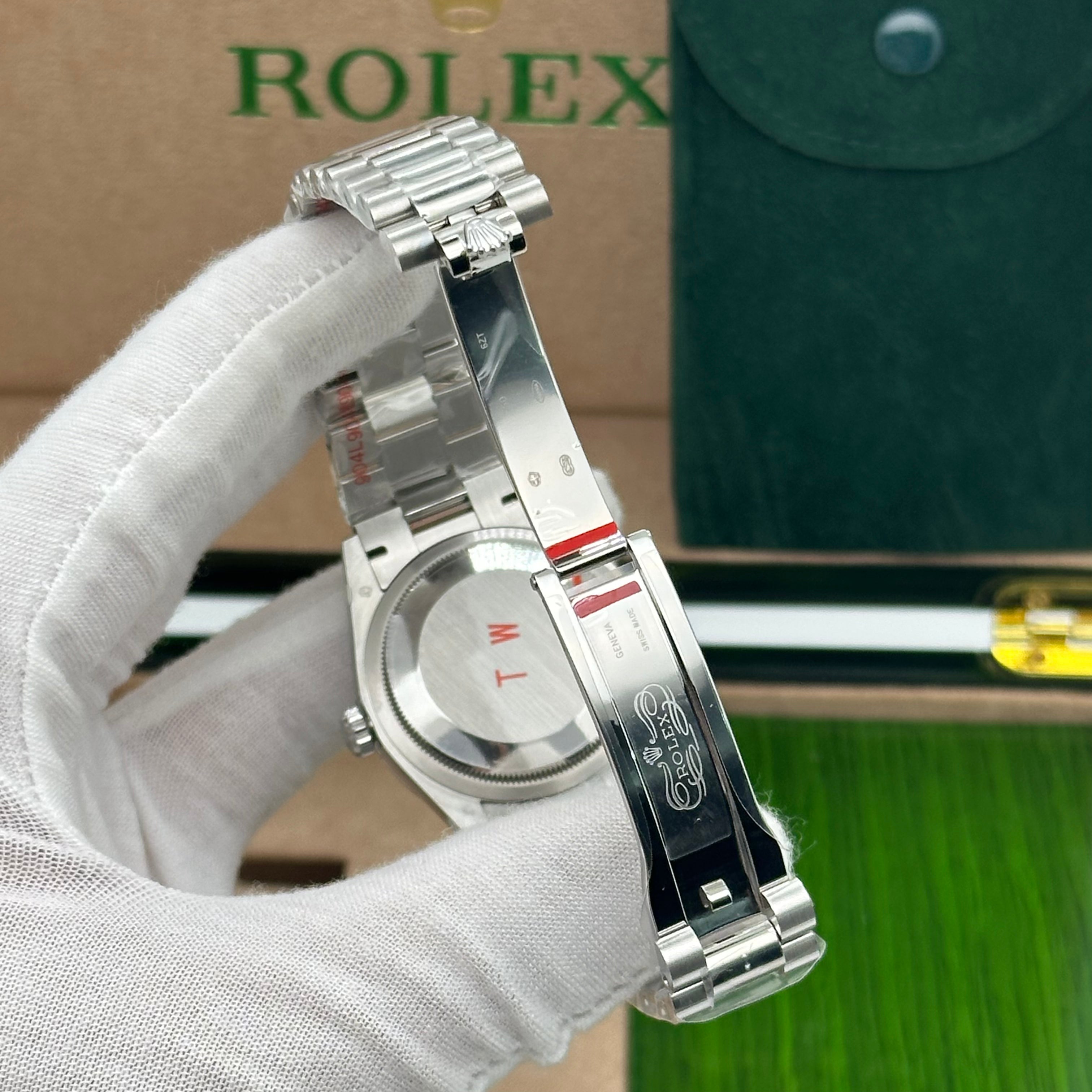 Rolex Day-Date 36MM White Gold Diamond-Paved Dial with Rainbow Sapphire Indexes